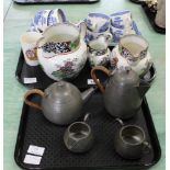 A set of three 'Mine' pattern Staffordshire graduated jugs, a Willow pattern part tea set,