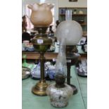 Three brass and glass oil lamps (one converted)