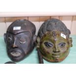 Two West African masks, one Yoruba,