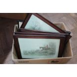 A set of four oak framed hunting prints,