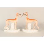 A pair of mid 19th Century Staffordshire greyhounds (one as found),