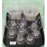 A set of eight mid 19th Century syllabub glasses plus seven Edwardian cut glass and etched finger