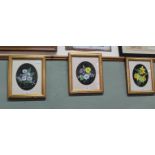 A set of three framed, glazed and mounted paintings of flowers,