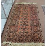 An acid washed Afghan rug,