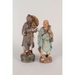 A pair of Chinese painted pottery figures