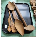 A group of African tribal spoons including Zulu and Chokwe stirrer