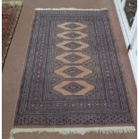 A pink and blue ground rug,
