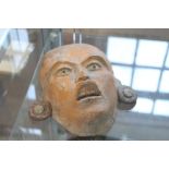 A South American (possibly pre Columbian) pottery mask