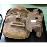 An African tribal mask and one other