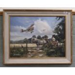 A framed oil painting on board of a farming scene with biplanes above