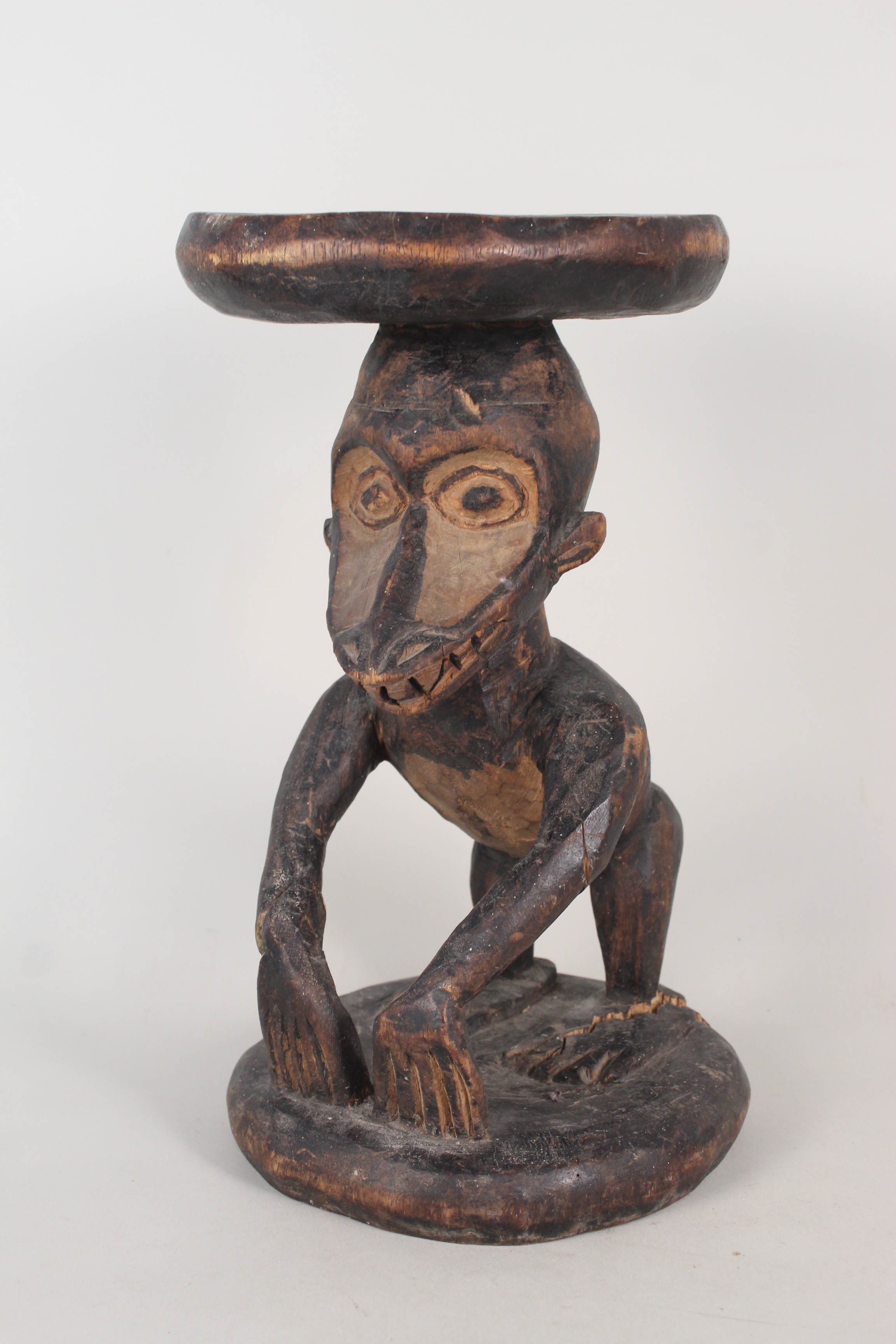 A West African tribal stool from the Cameroon depicting a monkey