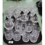 A tray of eight cut glass wine glasses,