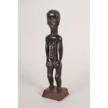 An African tribal figure, possibly Fang,