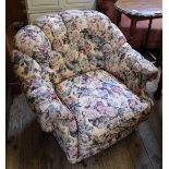 A late 20th Century floral button back armchair