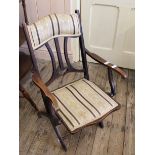 An early 20th Century folding mahogany chair