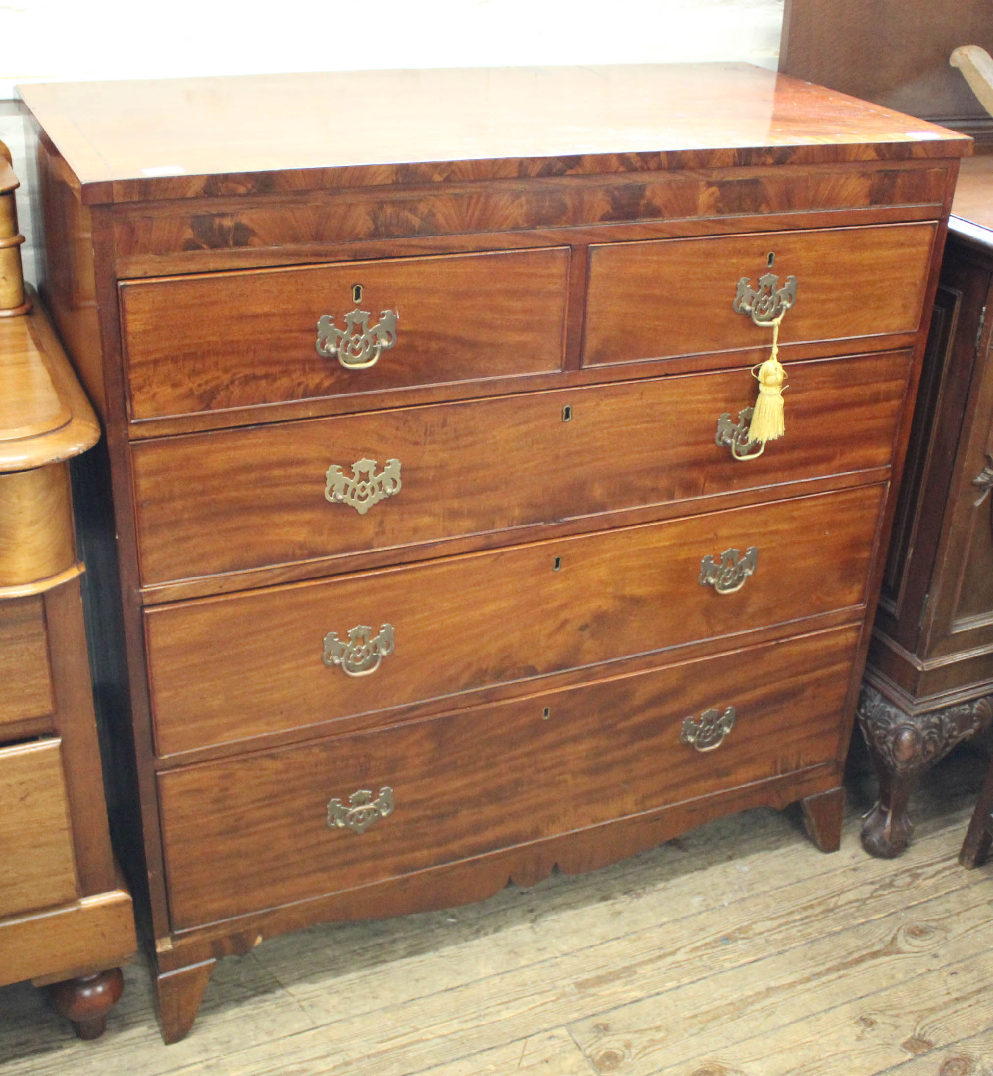 An early 19th Century mahogany five drawer chest