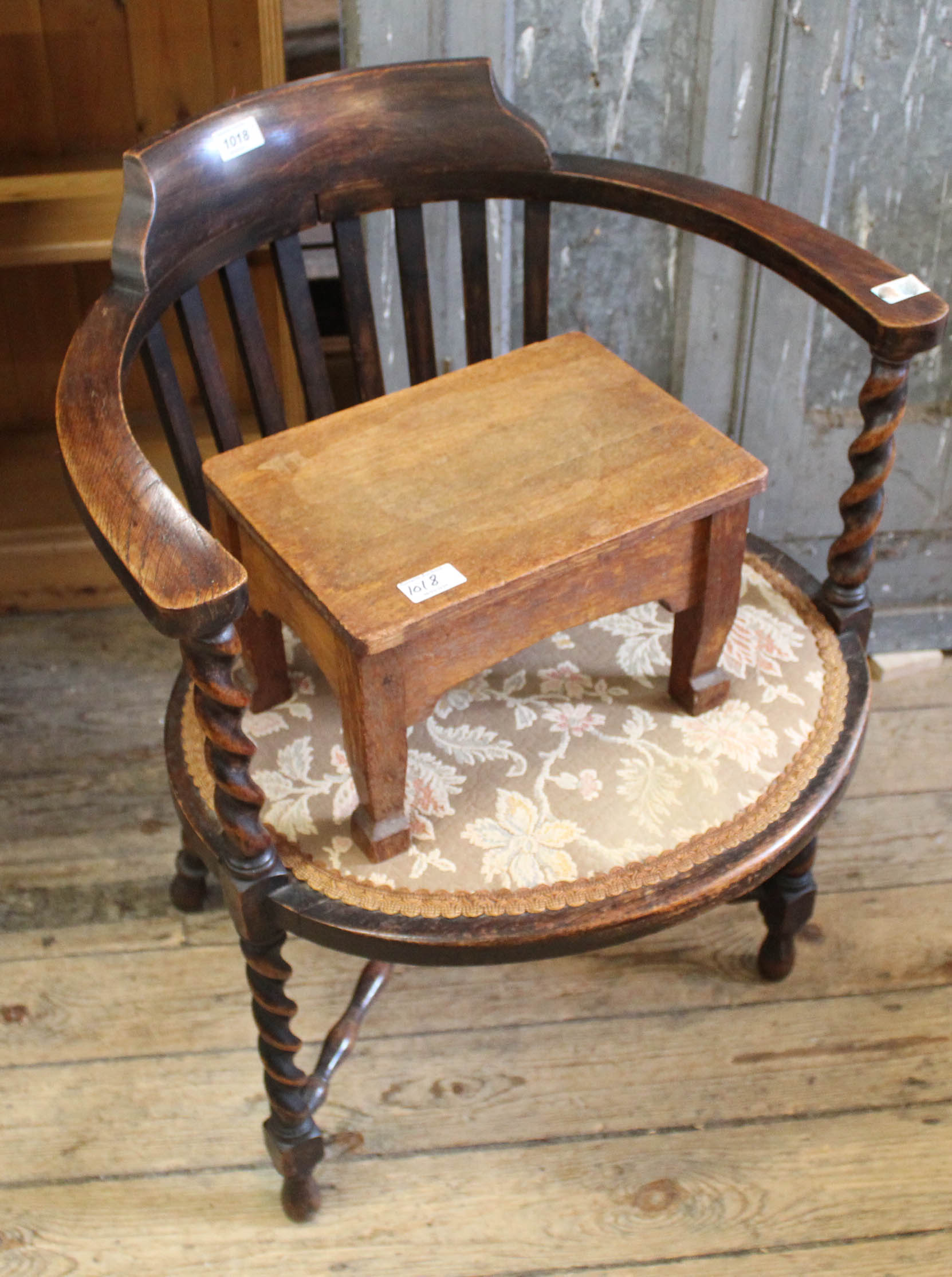 A 1920's oak barley twist tub chair and an oak stool