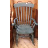A late 20th Century painted beech rocking chair
