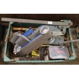 A box of metal working tools including sheet metal cutter