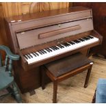 A modern Zendor mahogany small upright piano and a piano matching stool