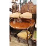 A pair of Edwardian mahogany chairs and another chair