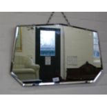 An Art Deco style bevelled mirror with chrome mounts