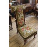 A Victorian mahogany high back needlework chair