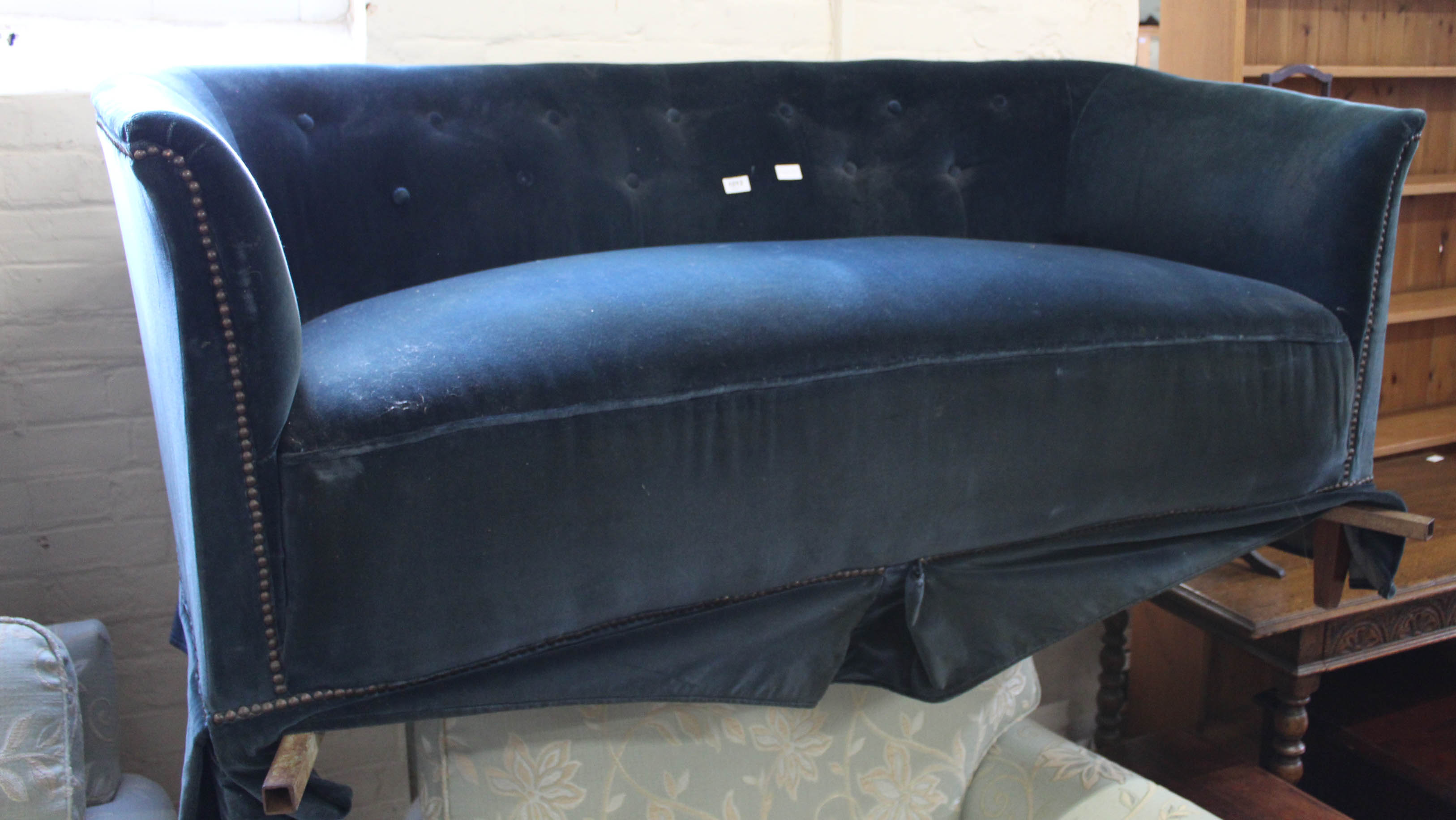 A 19th Century style blue velvet sofa