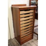 An oak Abbess tambour front cabinet,