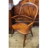 A late 20th Century stained beech and elm Windsor chair