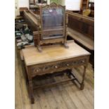 An early 20th Century carved oak dressing table