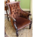 A mid 19th Century mahogany button back armchair