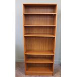 A teak effect adjustable bookcase