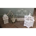 Various decorative white pained metal work items including coat hook,
