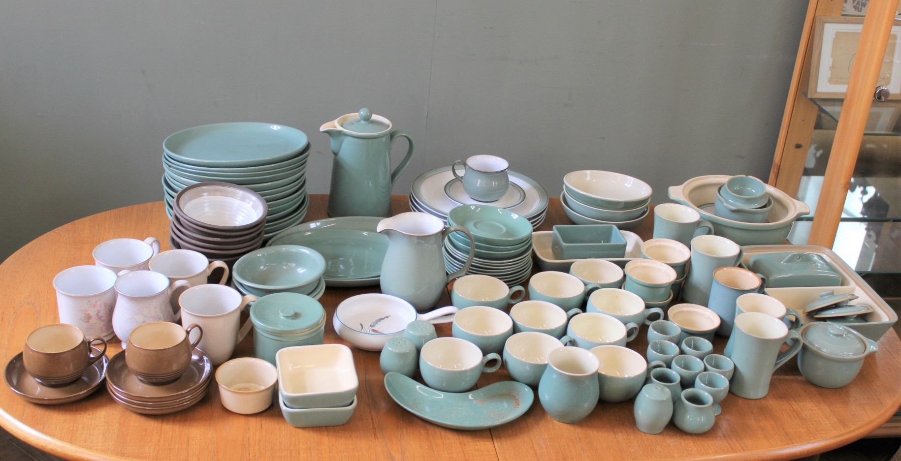 A large quantity of vintage turquoise Denby pottery dinnerwares and other china