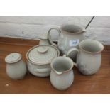 Assorted Denby pottery items including jugs and salt and pepper pots