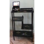 A 1950's black lacquer and Japanese painted shelving unit,