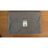 A brown leather Gucci envelope style wallet