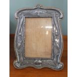 An Art Nouveau silver photo frame with kingfisher detail