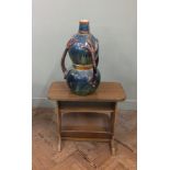 A magazine rack and large Majolica style vase (as found)
