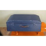 A large unusual shaped blue case by Brexton