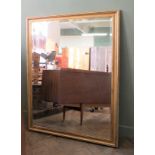 A very large gilt framed bevelled edge mirror