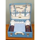 A vintage Brexton picnic set in blue case