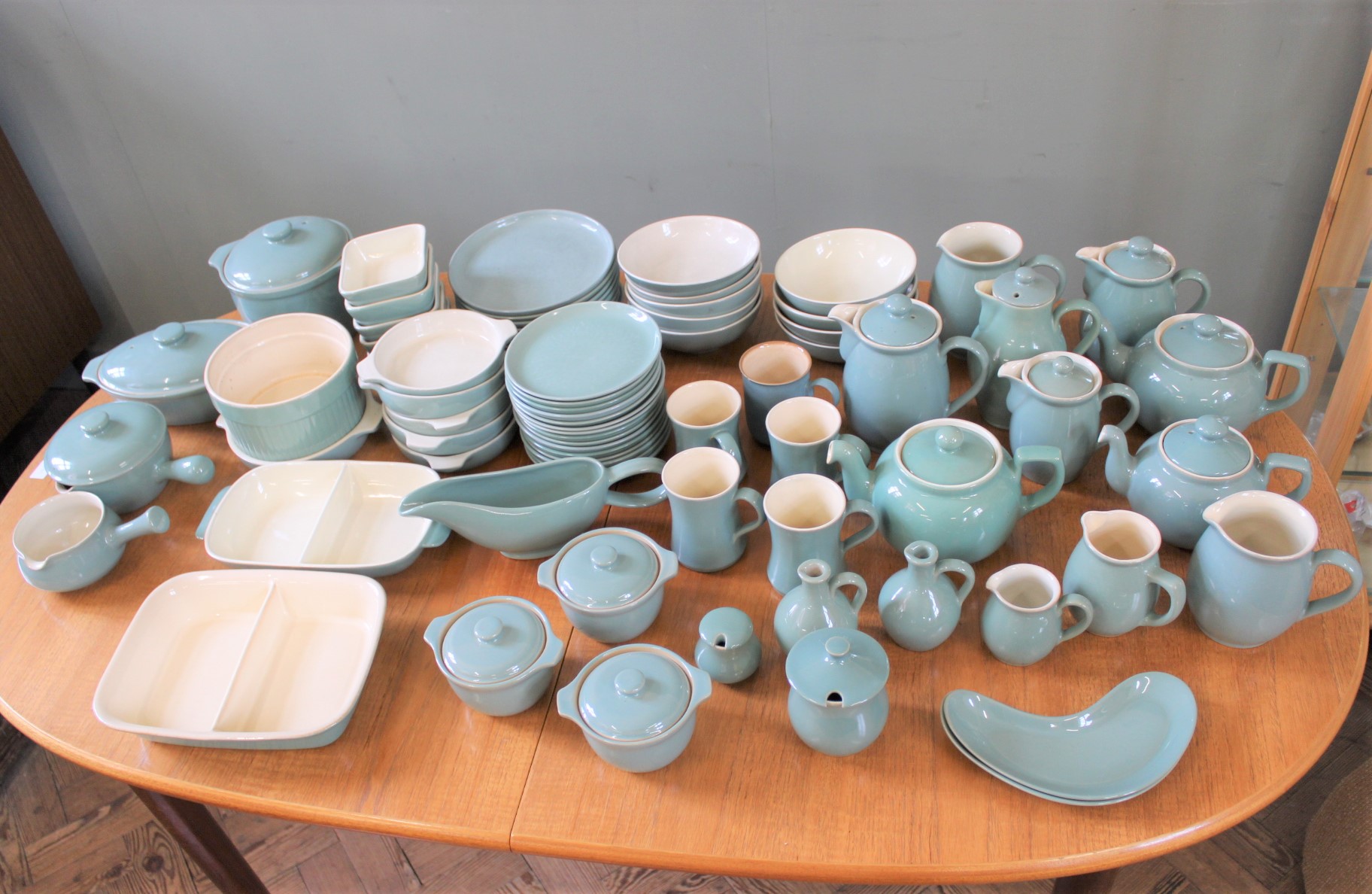 A very large quantity of vintage turquoise Denby china including dinner and tea wares