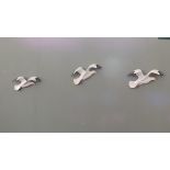 A set of three Beswick flying seagulls