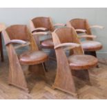 An unusual set of Scandinavian rustic armchairs with circular leatherette seats