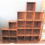 A Unix modular shelving system, comprising eight pieces and a base,