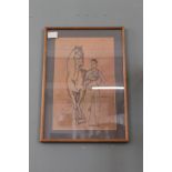 A framed Picasso print of a man and horse