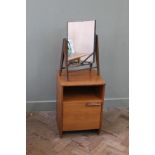 A bedside cabinet and toilet mirror