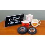 A Carling Extra Cold advertising lamp, water jugs and ashtrays.